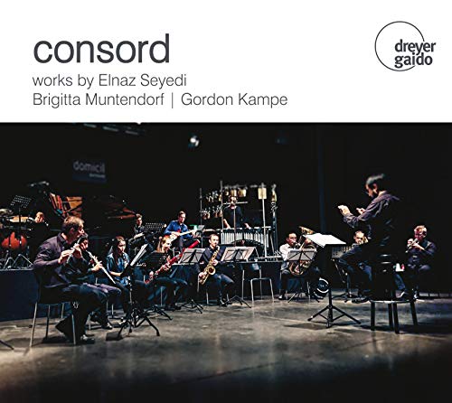 "CD cover featuring a conductor leading an ensemble of musicians on stage."