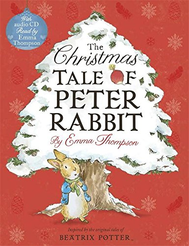 "Red book cover with snowy tree, Peter Rabbit, and Christmas theme."