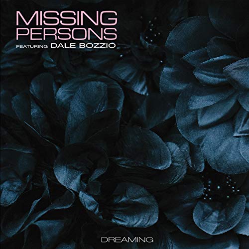 "Vinyl record cover with dark blue flowers and white text 'Missing Persons Featuring Dale Bozzio Dreaming'."