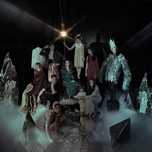 "Album cover art featuring a group of people in various poses, surrounded by fog."