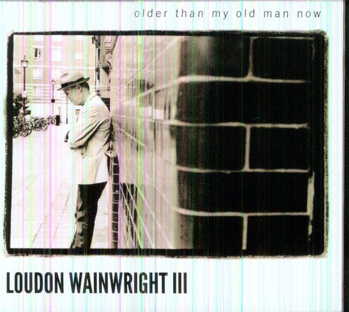 "Album cover with black-and-white image of man leaning against a brick wall."