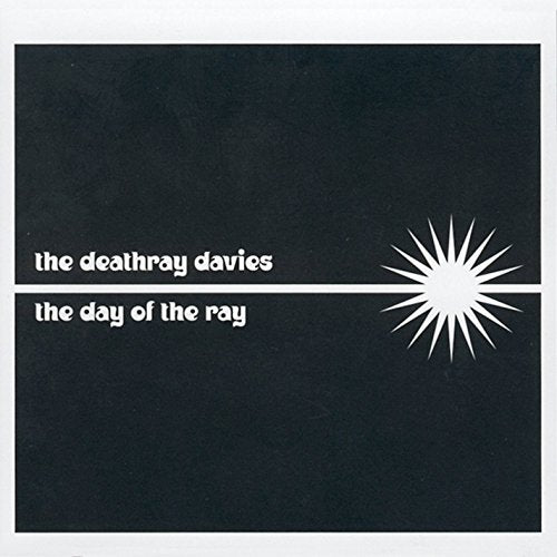 CD cover: black background with white text and starburst graphic.