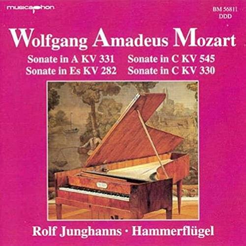 "Pink CD cover with a painting of a grand piano on it."