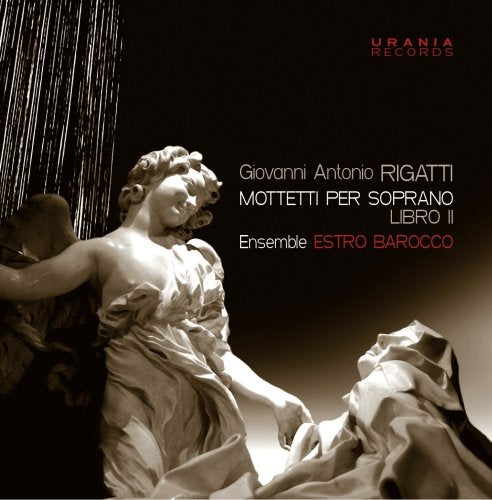 "CD cover featuring a marble statue of a woman with flowing robes."