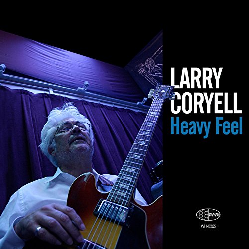 "Album cover featuring Larry Coryell holding a guitar, with title 'Heavy Feel'."