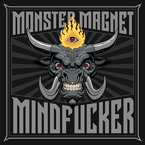 "Album cover featuring a bull's head with horns and a flame on its forehead."