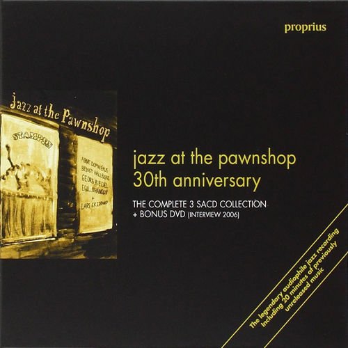 A black CD cover with yellow text and a sepia-toned image on the left.