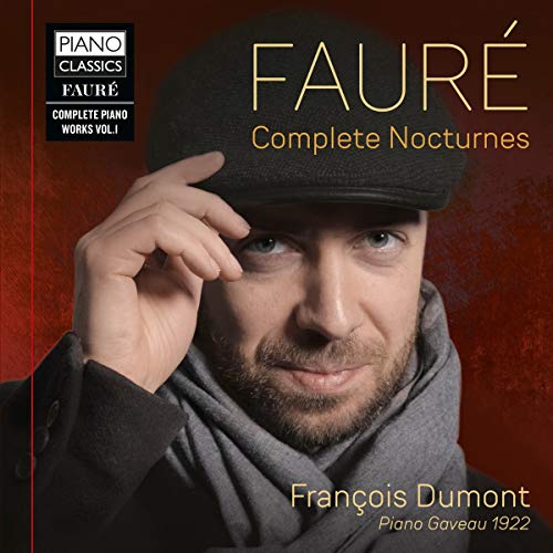 CD cover with a man in a hat against a red background.