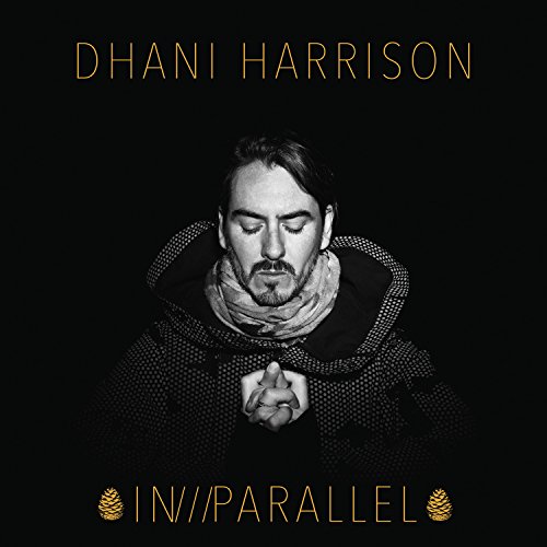 Black and white album cover featuring a man with his eyes closed, hands clasped.