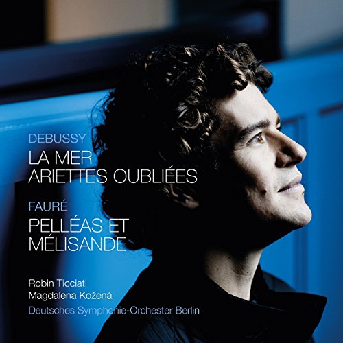 "CD cover featuring a man with curly hair against a blue background with white text."