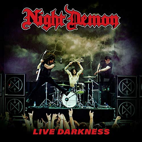 "Album cover featuring a band performing on stage with a crowd and stormy background."