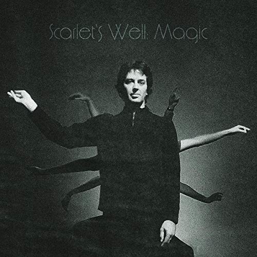 Black and white vinyl album cover with a person and multiple arms.