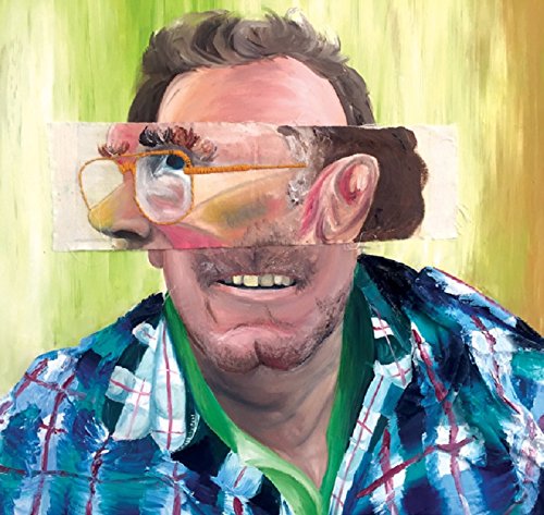 A man with a painted strip covering his eyes, wearing a blue plaid shirt.