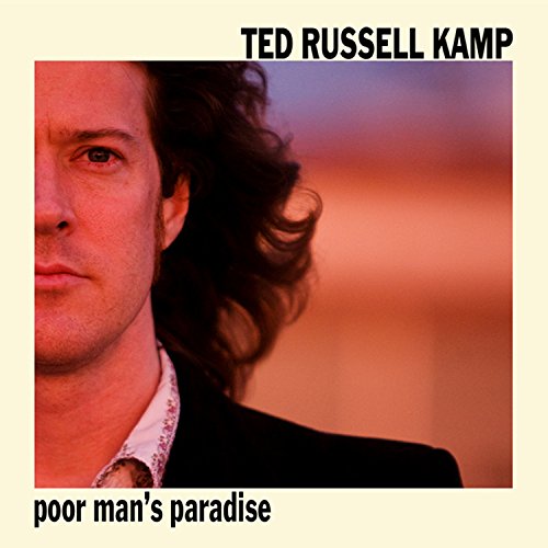 Album cover featuring Ted Russell Kamp with a blurred desert background and beige border.