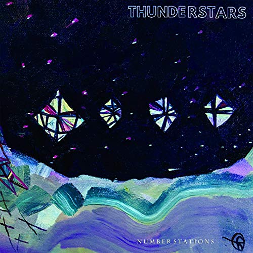 Vinyl album cover with abstract, colorful artwork and stained-glass-like shapes against a dark background.
