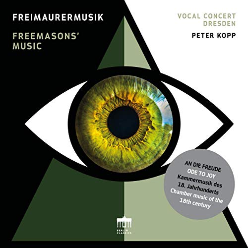 "Album cover with a green eye on a black and green triangle."