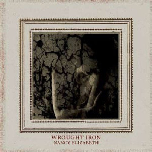 A sepia-toned album cover with a textured, hand image and artist name displayed.