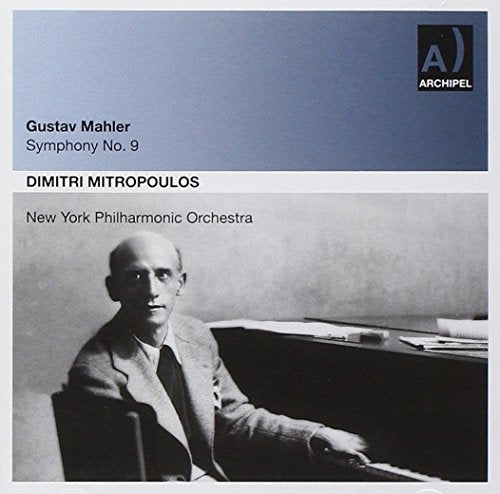 CD cover featuring a black-and-white photo of a man sitting at a piano.