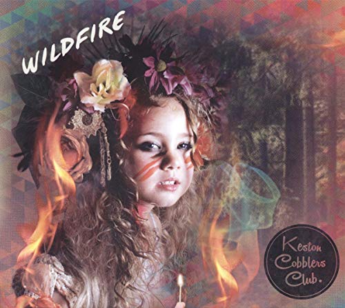 Young girl with floral headpiece surrounded by flames, on a vinyl album cover.