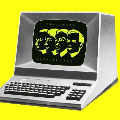 Vintage computer with screen displaying Kraftwerk's "Computer World" album cover on bright yellow background.