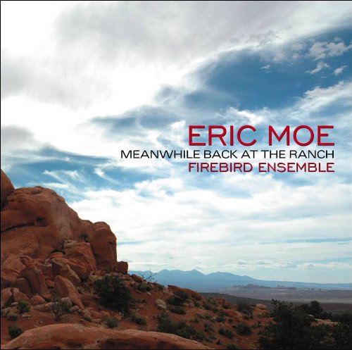 "Album cover featuring a desert landscape with rocky formations and a cloudy sky."