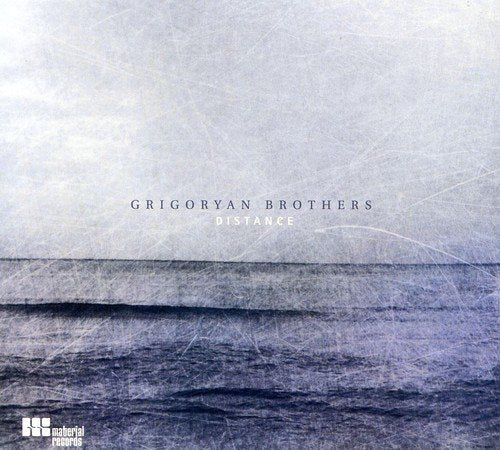 "CD album cover with 'Grigoryan Brothers - Distance' on a textured, purple-toned background."