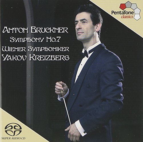 Conductor Yakov Kreizberg in a tuxedo holding a baton, on a CD cover.