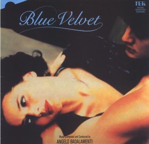 "CD cover with a man and woman, 'Blue Velvet' title in blue script."