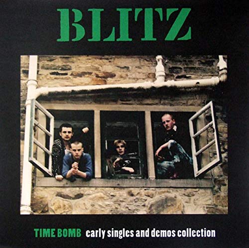 "Album cover featuring four men leaning out of a stone building's open windows."