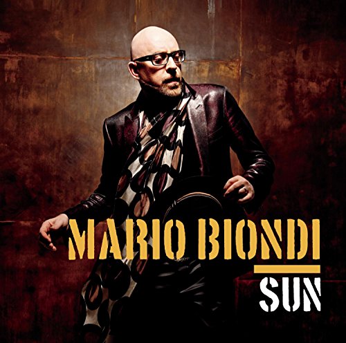 Mario Biondi album cover with a man in a leather jacket and patterned shirt.