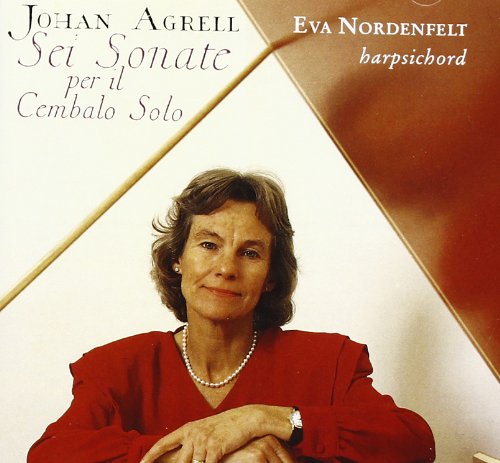 CD cover with a woman in red, pearl necklace, and short brown hair.