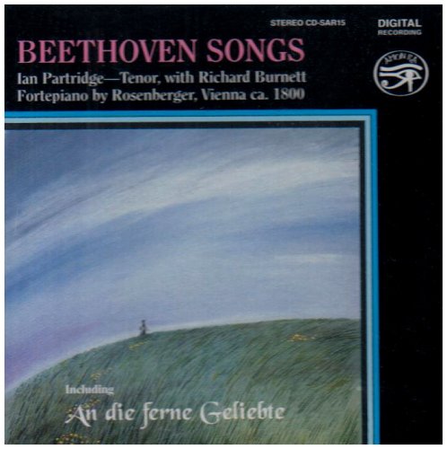 "CD cover with a serene landscape and a person on a hill."