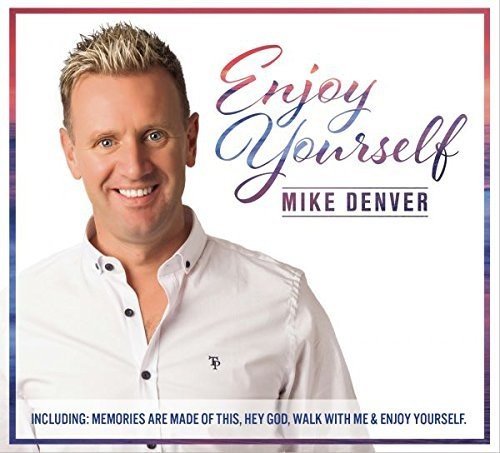 "Album cover featuring a smiling man with blond hair, wearing a white shirt."