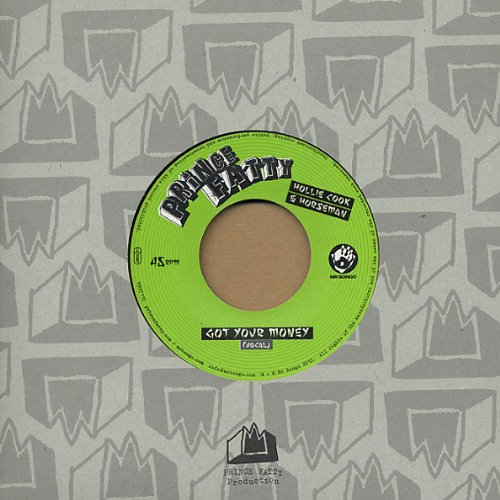 A vinyl record with a green label on a patterned grey sleeve.