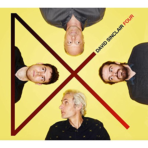 "Album cover with four men in a square formation against a yellow background."