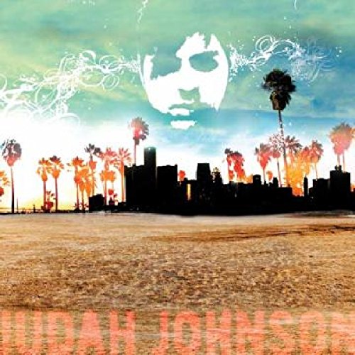 "Album cover with a silhouette of a city skyline and a face."