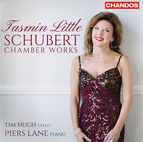 CD cover featuring a woman in a maroon dress against a white wall.