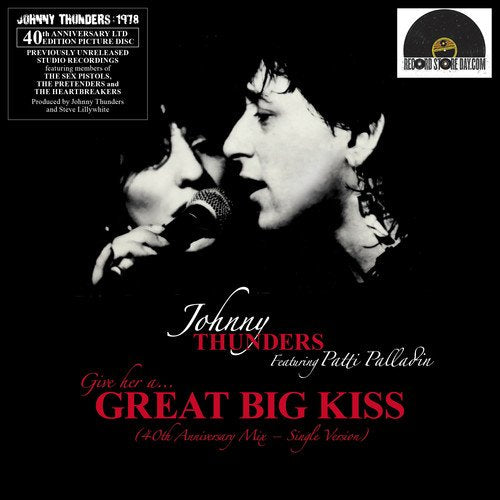 Vinyl record cover with black background, featuring Johnny Thunders and Patti Palladin singing.