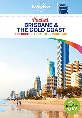 "Travel guide book cover featuring a beach scene with city skyline and text."