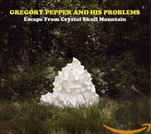 Album cover with a white geometric structure in a forest, titled "Escape From Crystal Skull Mountain".