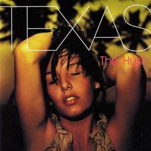 Album cover featuring a woman with dark hair and a floral top, arms raised.