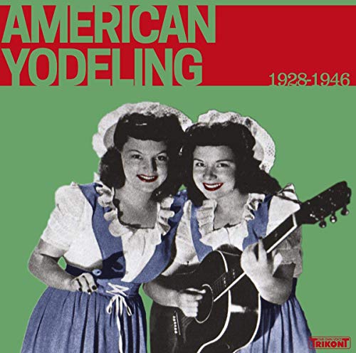 Vinyl album cover featuring two women in traditional dresses holding a guitar.