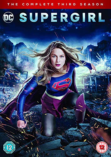 "Supergirl DVD cover featuring a woman in a superhero costume amidst city destruction."