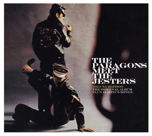 "CD cover with two men in black costumes and hats, one kneeling, one standing."