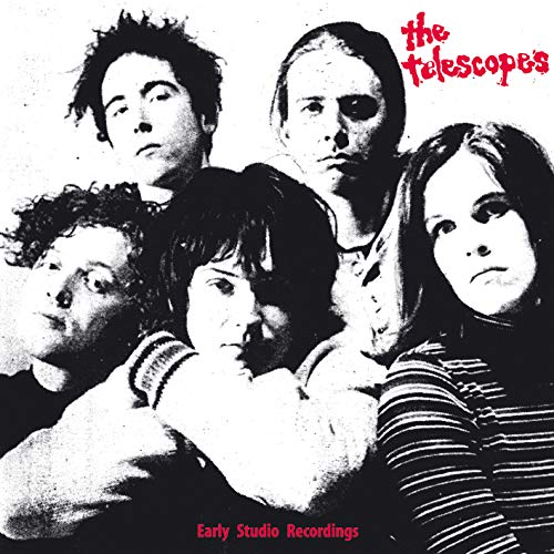 Black and white photograph of five people on a vinyl record album cover.