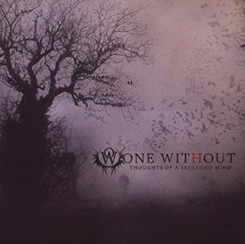 "CD cover art featuring a dark, foggy forest scene with a bare tree silhouette."