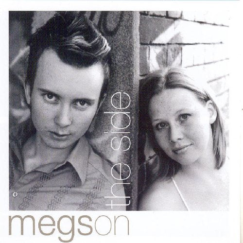 "Black and white CD cover with man and woman beside a brick wall."