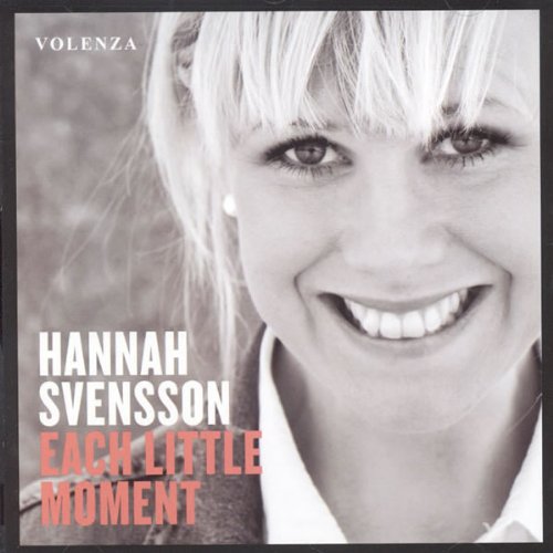 "CD cover with black and white photo of smiling woman and text."