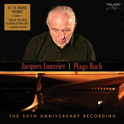 "CD cover featuring Jacques Loussier at a piano, with red and gold text."