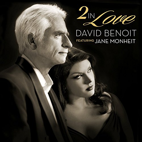 "Black and white CD cover featuring a man and woman, formal attire, against a dark background."